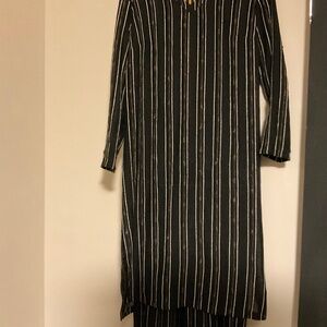 Two piece set..pants and tunic. Approximate size medium